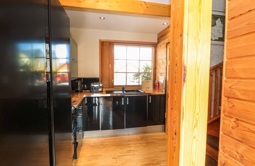 Woodhorn Cottage | SWALLOW LODGE, pet friendly, with a garden in Amble