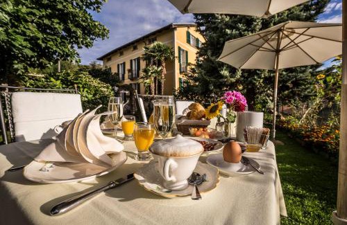 Carona Hotel | Swiss Historic & Garten Hotel Villa Carona