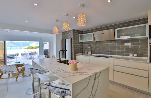 Nettle Bay Condo | SXM Luxury Beachfront Condo On The Beach sea view Tropical Garden Pools Tennis
