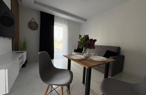 Brzeg Apartment | Tabago Studio 33 Brzeg Ofiar Katynia