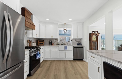 Oxford House | Tan Lake Oasis: Modern Lakefront w/Game Room, 2 min to Downtown Oxford