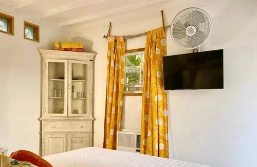 Coral Harbour Cabin | Tangerine Sunsets Lower Island Charm
