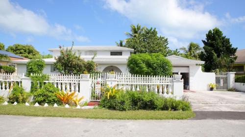 Nassau House | Tangerine Sunsets Winton Rose