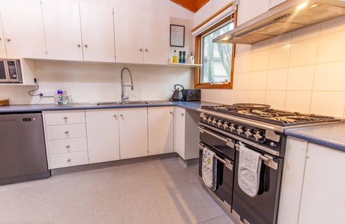Baw Baw Village Cabin | Tanjil Creek Lodge - Bedroom 1 (modern, ensuited with kitchenette)