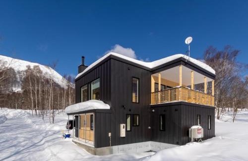 Rusutsu House | Tanuki House with air conditioner - walk to Rusutsu Resort