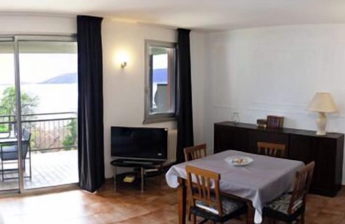 Susello Apartment | Tastefully furnished 3½-room duplex apartment with two balconies in a residence with pool