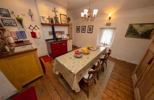 Cordal Cottage | Thatched Cottage with Hot Tub walking distance to Hughe's Pub.