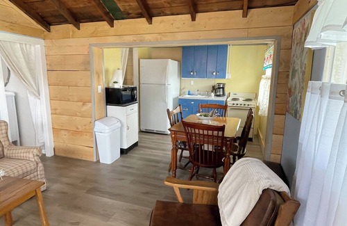 Canadohta Lake Cottage | The Bluebird, a rustic lakefront cottage at The Pier at Canadohta Lake sleeps 6!
