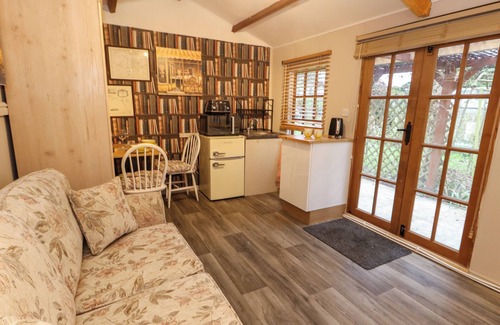 New Forest District Cottage | THE CABIN AT LITTLE TIMBERS, pet friendly, with open fire in Ringwood