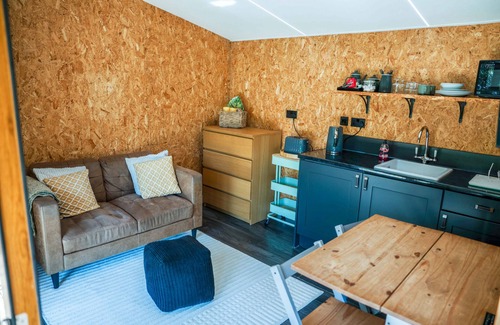 Carlisle Cabin | The Chard with hot tub overlooks a wildlife pond sleeping 2