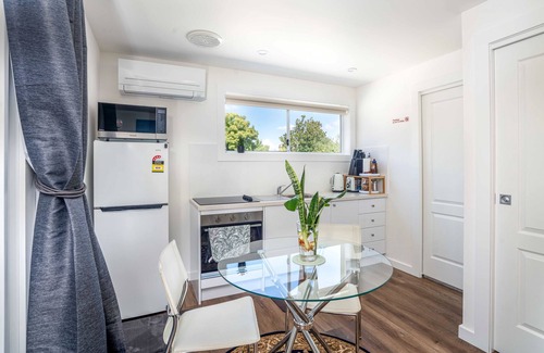 Orange Apartment | The Compact Cube - One-Bedroom Apartment on Summer