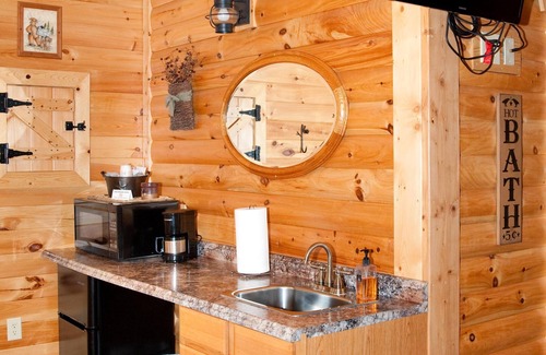 Flintstone Ski Chalet | The double cabin has 2 queen beds, 1 king bed, 1 sleep sofa for 1 child. Cabin has common porch and each unit has a private entrance.