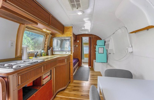 Driftwood House | The Driftwoods - Vintage Blue Airstream for Unique Driftwood Getaway