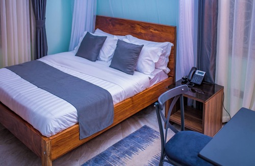 Kabale Bed & Breakfast | The Georges' Residence a luxurious villa providing white glove services.