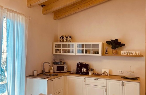 Scandiano Bed & Breakfast | The house in the woods room 1 surrounded by greenery, a few minutes from reggioE and Modena