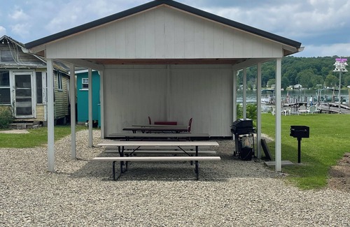 Canadohta Lake Cottage | The Hummingbird rustic lakefront cottage at The Pier at Canadohta Lake sleeps 7!