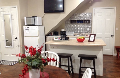 Marshall House | The Little Red Cottage is situated in a quaint country neighborhood