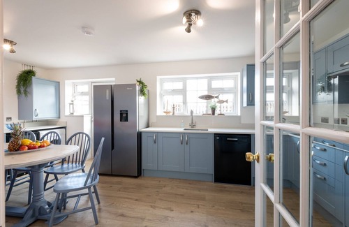 Rhosneigr House | The Moorings: 5-bed villa in Rhosneigr, walk to beach & village