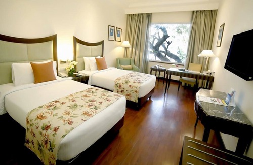 Nehru Place Hotel | The Muse Sarovar Portico Nehru Place Delhi