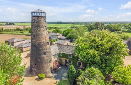 Stoke Ferry House | The Old Mill, 7 storey, dog friendly outdoor pool & bbq