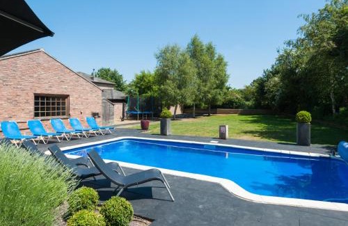 Stoke Ferry House | The Old Mill, 7 storey, dog friendly outdoor pool & bbq