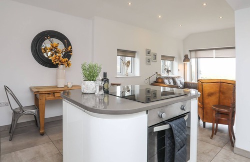 Denbigh Cottage | The Old Piggery - a cosy fire that sleeps 2 guests in 1 bedroom
