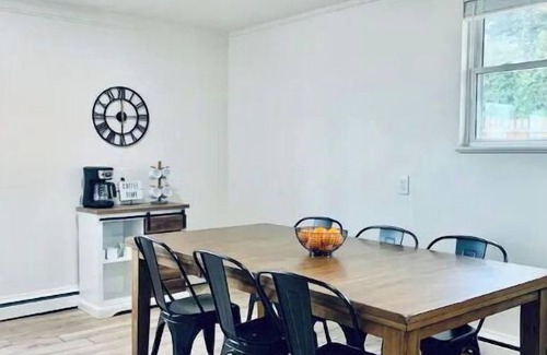 Eden House | The Orange House with heated pool, Sleeps 8
