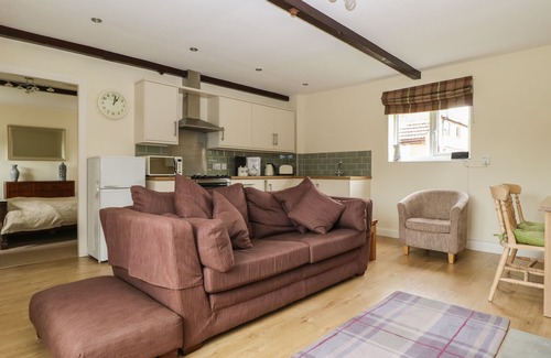 Storwood Cottage | THE PADDOCK, with open fire in York