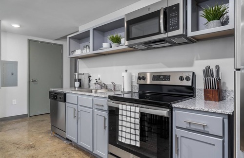 Central City Condo | The Perch- Amazing View/King Bed/Gym/Gated Parking