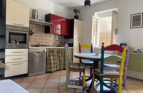 Orta San Giulio Apartment | The Pink House of Riso Amaro In the painted village Legro of Orta San Giulio