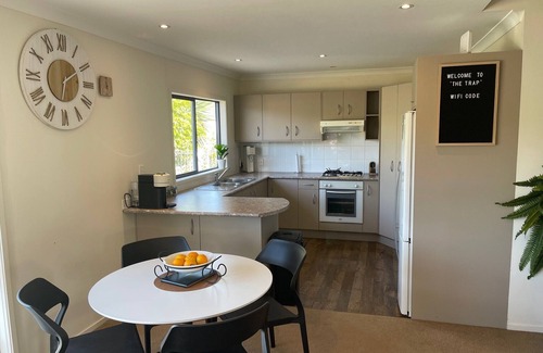 Mangawhai Heads House | The Sun Trap with a spa in the Heads - Great for families and groups
