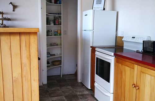 Tairua House | The Tairua Tree House - a traditional NZ bach overlooking Tairua harbour