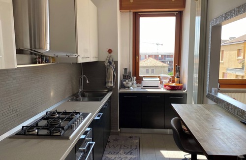 Biassono Apartment | The terrace a stone's throw from the runway