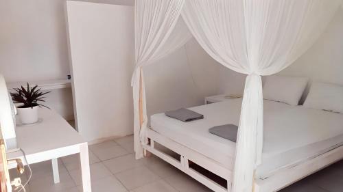 Rua Hotel | the village rua beach homestay