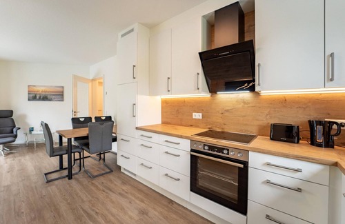 Bad Zwischenahn Apartment | The "Weißer Weg" vacation apartment offers 81 square meters of modern comfort for up to four people.