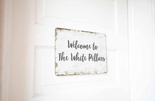 Clarion House | The White Pillars