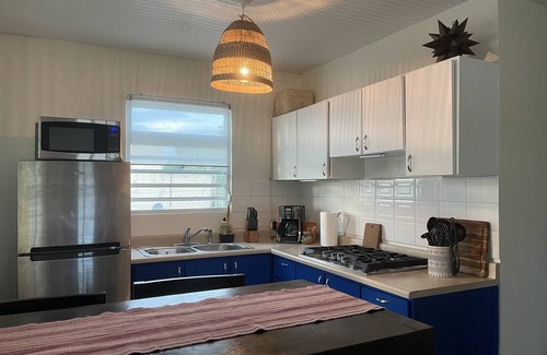 Gobernador Pinero Apartment | The Yellow Door Casita A/C, Parking, Private Balcony & more
