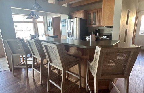Spirit Lake House | The Yellow House on East Lake! Dock access to bring your boat.
