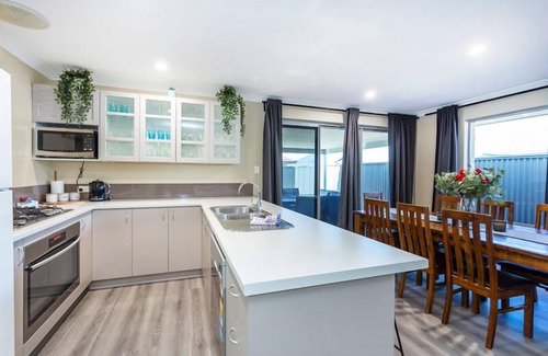 Wellard House | This 4 bedroom, 2 bathroom home is located in the picturesque family-friendly Sunrise Estate. Pet