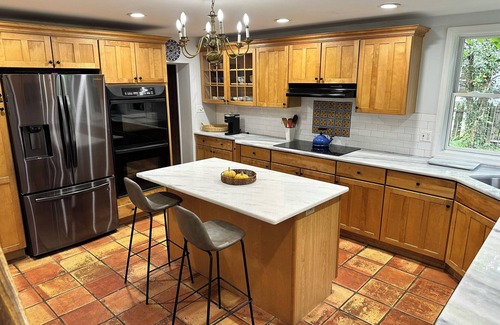Bala-Cynwyd House | This 4 BR 4 BA sizable home with large outdoor porch & yard is ideal for a family visiting the area.