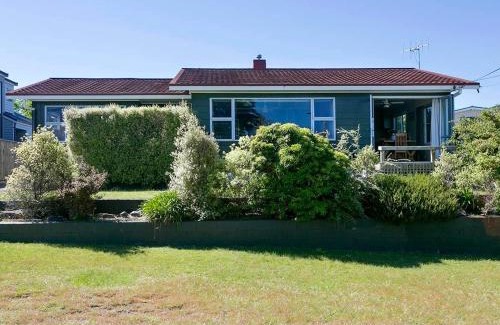Rainbow Point House | This Bach Has it All - Rainbow Point Holiday Home