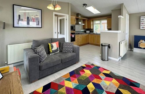 Raywell Ski Chalet | This deluxe two bedroom lodge even has its own games den.