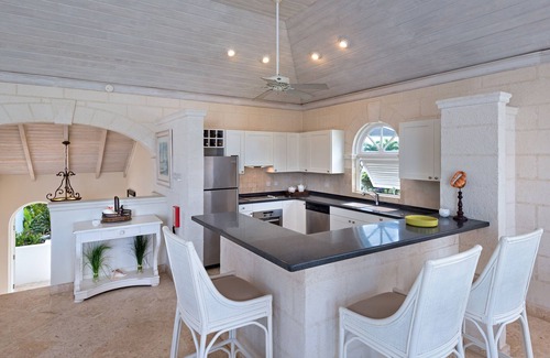 Merlin Bay House | This elegant 3-bedroom, the 3.5-bathroom townhouse
