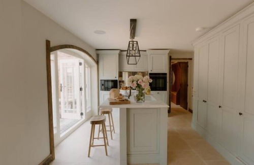Bunbury House | This historic building offers an inviting retreat with its charming blend of comfort and elegance.