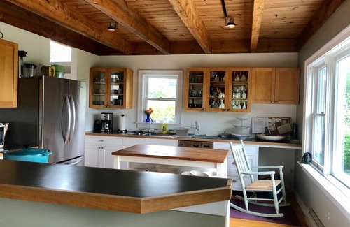 Tiverton House | Three acre farm house with water view and contemporary furnishings.