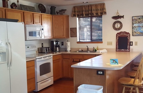 Grand Lake Cabin | Three story cabin with 3 bedrooms, 3 full bathrooms and a loft for 12 people