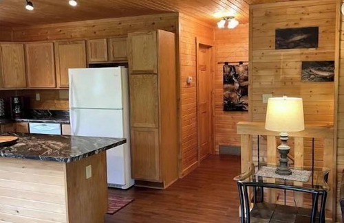 Westby House | Timber Coulee Creek in backyard, king size bed, grill on deck, large garage.