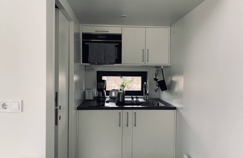 Stadtlauringen Apartment | Tinylodge (25sqm) in ecological style with sleeping lofts and terrace