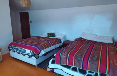 Puno Cabin | Titicaca Kontiki lodge, culture, landscapes and nature for families and couples,