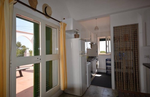 Arenella Villa | Top floor in a stunning villa on the sea with panoramic terrace and tennis court